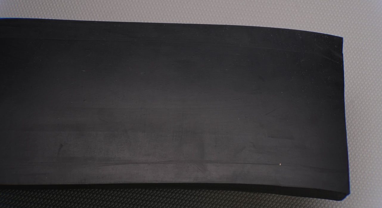 Front side view of MOR rubber conveyor belt with 1/2 inch thickness, black color, top and bottom rubber.