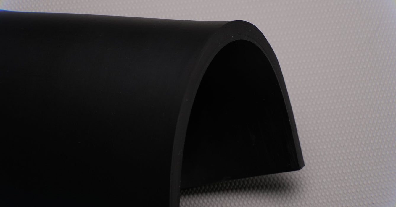 Side view showing the thickness of MOR rubber conveyor belt with 3/8 inch thickness, black color, top and bottom rubber.
