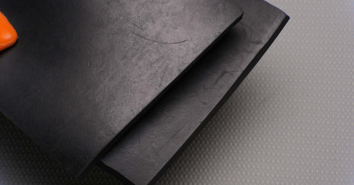 Top and bottom side views of MOR rubber conveyor belt with 1/4 inch thickness, black color, top and bottom rubber.