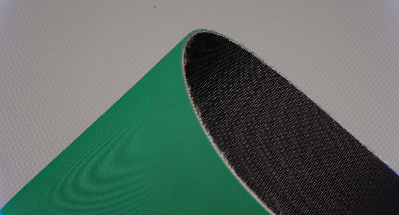 NC nylon conveyor belt with green diamond top, black fabric bottom, 2mm thickness, 1-layer.