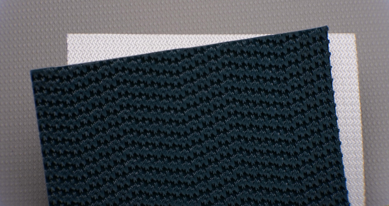 View showing both front and back sides of PVC conveyor belt with 4.5mm thickness, green rough top color, and white fabric bottom color.