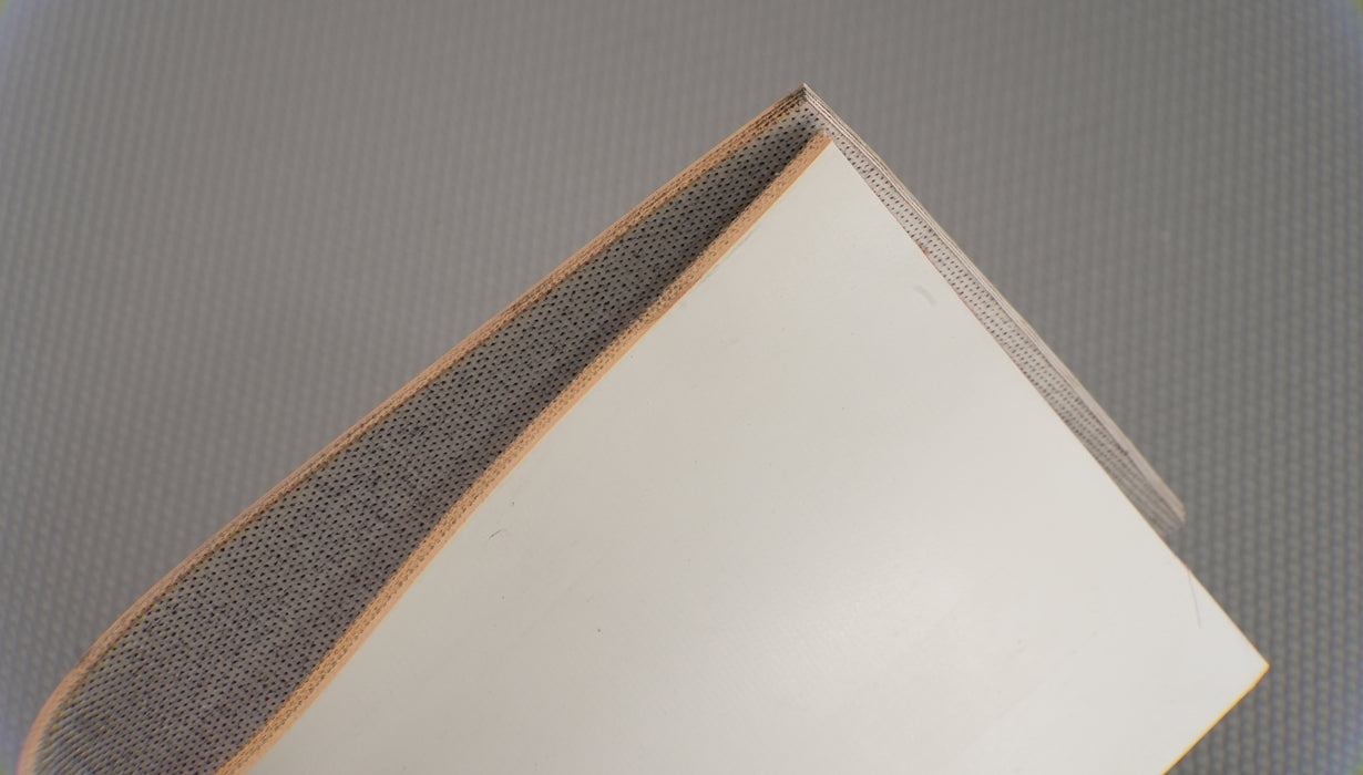 Smooth white top of RBR 3-layer woven conveyor belt.