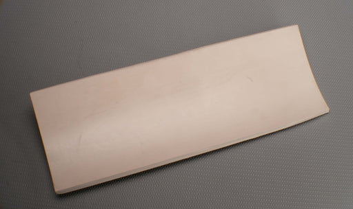 Front view of rubber conveyor belt with smooth white surface, 1/4 inch thickness, durometer 60, tensile strength of 700 psi, and elongation of 300%.