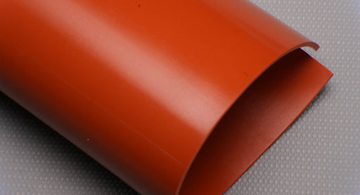 Second top and bottom view of silicone rubber conveyor belt with smooth red surfaces, 1/16 inch thickness, and temperature range of -67°F to +450°F.