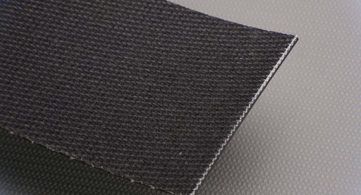 Back side of PVC conveyor belt with black brush bottom. The belt is 9/64" thick with 1 interwoven fabric layer and a strength of 1% elongation at 0.073 lbs/in.
