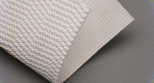Conveyor belt showing the white fabric bottom side, 4.5mm thickness, made of 2 layers of monofilament fabric, with a strength of 1% elongation at 8nm.
