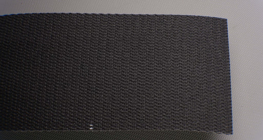 Front side of PVC conveyor belt featuring black fabric top. The belt is 3.5mm thick, with 1 layer of interwoven fabric and a strength of 1% elongation at 28nm.