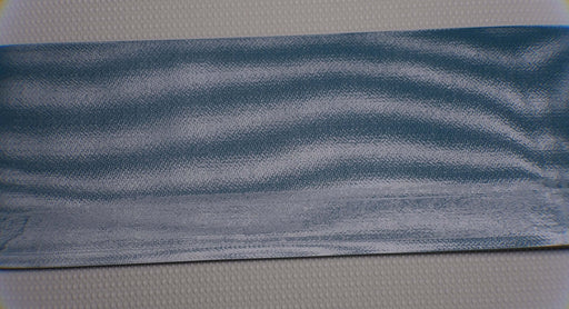 Front side of PVC conveyor belt with a green smooth top. The belt is 2mm thick, composed of 2 monofilament fabric layers with a strength of 1% elongation at 8nm.