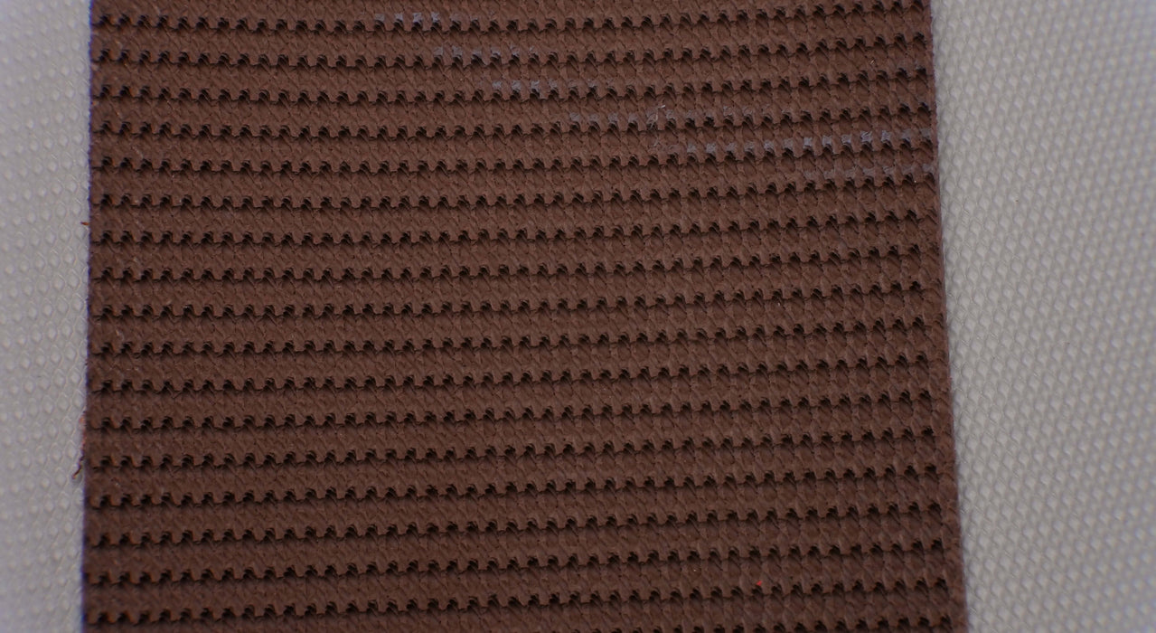 RBR conveyor belt showing the back and bottom side with woven fabric. The top is brown, the bottom is tan, with a thickness of 7mm and a strength of 42nm.
