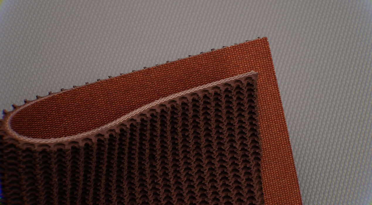 Front, top, bottom, and back side views of RBR conveyor belt showing brown rough top and tan fabric bottom. The belt is 7mm thick, with 3 layers, woven fabric, and a strength of 1% elongation at 42nm.