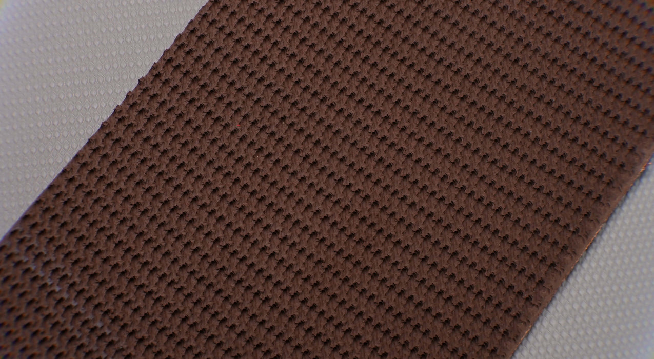 Front side view of the RBR woven conveyor belt with a rough top and fabric bottom, 7mm thickness, brown top, and tan bottom.