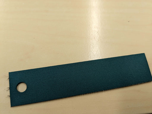 Top view of nylon conveyor belt materials showing green top fabric and black bottom fabric, 1.1mm thickness.