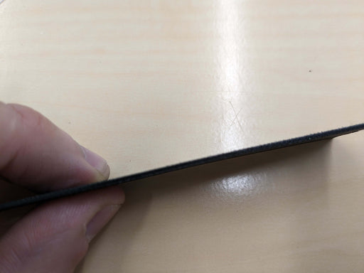 Another top view of nylon conveyor belt materials with green top fabric and black bottom fabric, 1.1mm thickness.
