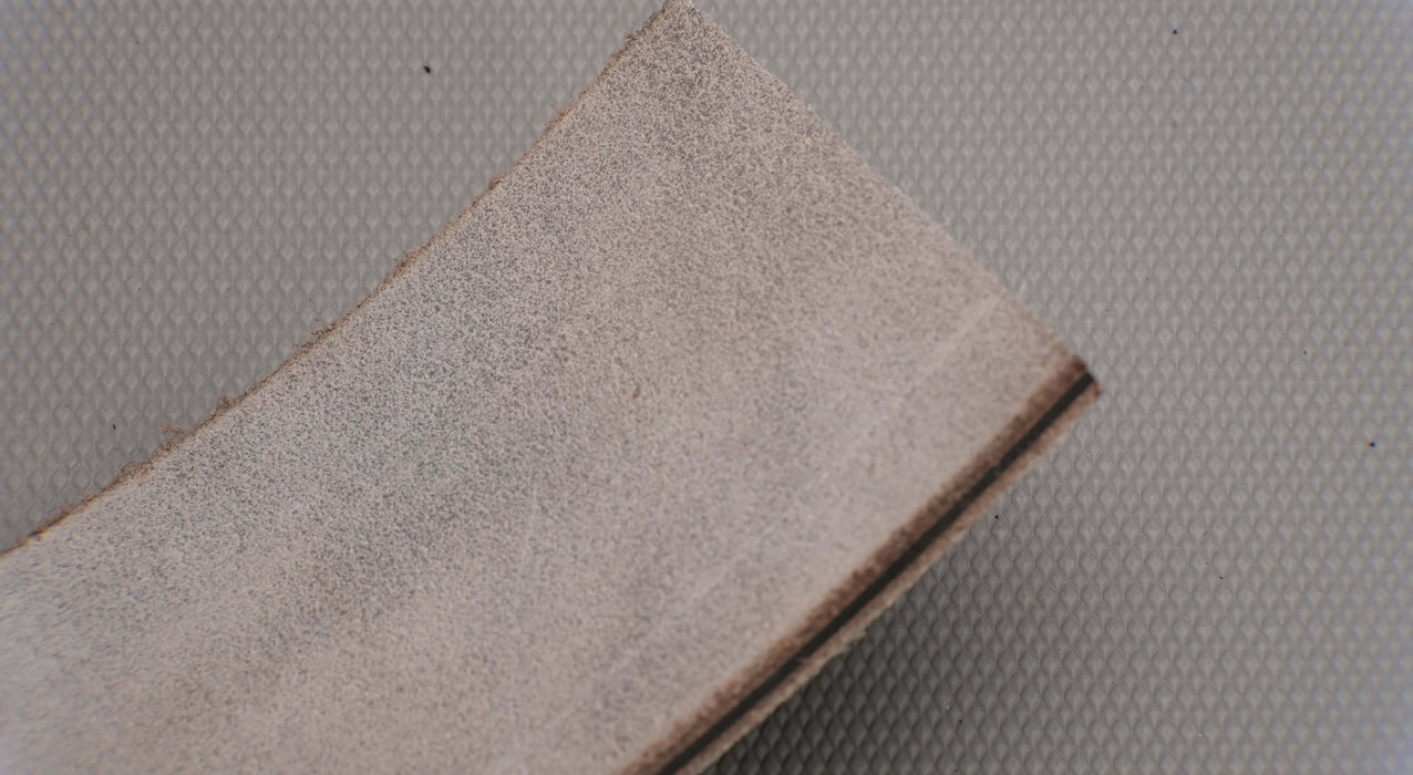 Bottom view of leather conveyor belt with grey color, 3 layers, 5.6mm thickness.