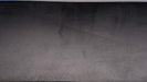 Back side view of MOR rubber conveyor belt with 1/8 inch thickness, black color, top and bottom rubber.