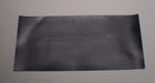 View of MOR rubber conveyor belt showing black bottom surface, 1/16" thickness.