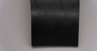 Full view of MOR rubber conveyor belt displaying black top and bottom, 1/16" thickness.