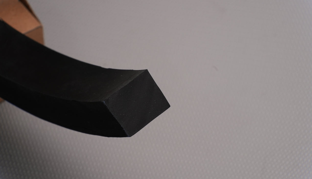 Dual view of MOR rubber conveyor belt with black top and bottom, 1" thickness, both sides visible.
