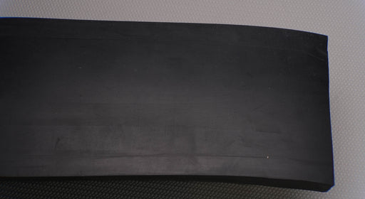 Front side view of MOR rubber conveyor belt with 1/2 inch thickness, black color, top and bottom rubber.