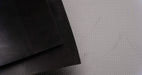 Front and back side views of MOR rubber conveyor belt with 1/16 inch thickness, black color, top and bottom rubber.