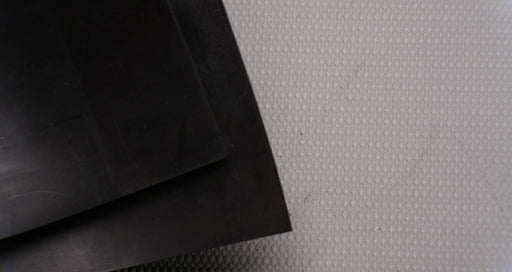 Front and back side views of MOR rubber conveyor belt with 1/16 inch thickness, black color, top and bottom rubber.