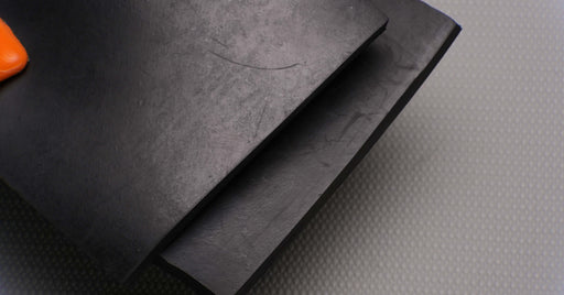 Top and bottom side views of MOR rubber conveyor belt with 1/4 inch thickness, black color, top and bottom rubber.
