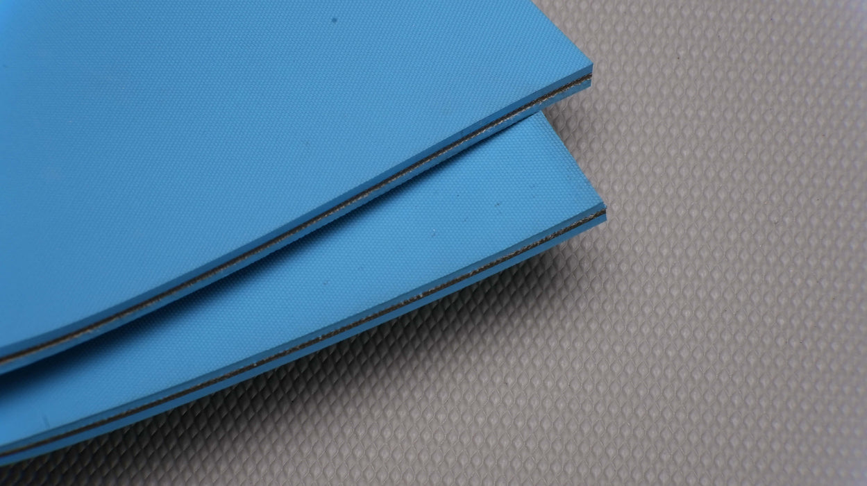 NC conveyor belt showing both front and back sides, featuring blue diamond surfacing and 6mm thickness.







