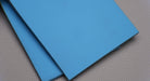 NC conveyor belt showing both front and back sides with diamond surfacing, blue color, and 6mm thickness.