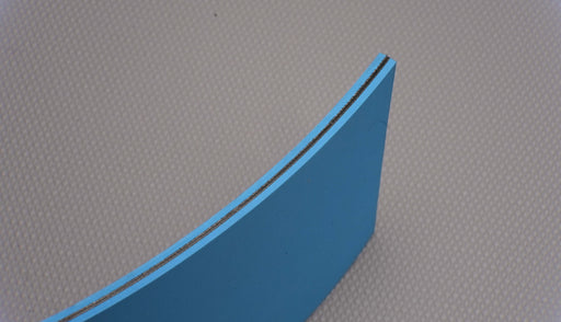 Side view of NC conveyor belt showing 6mm thickness and back side with diamond surfacing in blue color.