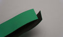 NC nylon conveyor belt showing green diamond surfacing top and black smooth bottom, 1.4mm thickness, both sides.