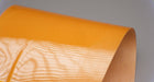 Top view of PU conveyor belt with amber glossy top and transparent bottom, 0.75mm thickness.