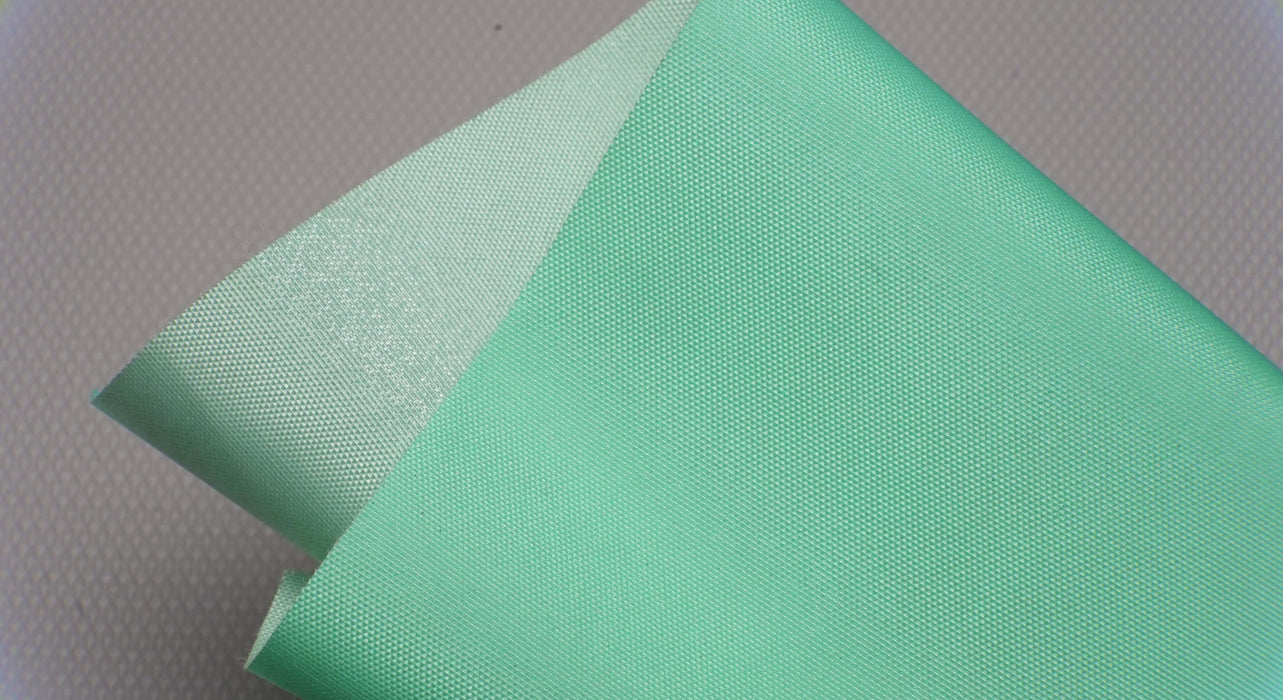 View of PU conveyor belt with green impregnated top and bottom, 0.40mm thickness, both sides.