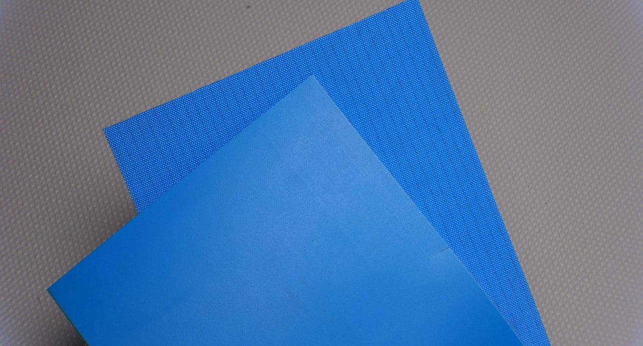 View showing both top and bottom sides of PU conveyor belt with 1.2mm thickness, blue mat top color, and white fabric bottom color.