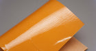 Top view of PU monofilament conveyor belt showing amber glossy surface, 0.75mm thickness.