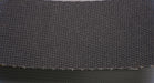 Back view of PVC conveyor belt with brush bottom, black color, and 9/64 inch thickness, made from interwoven fabric with 0.073 lbs/in strength.