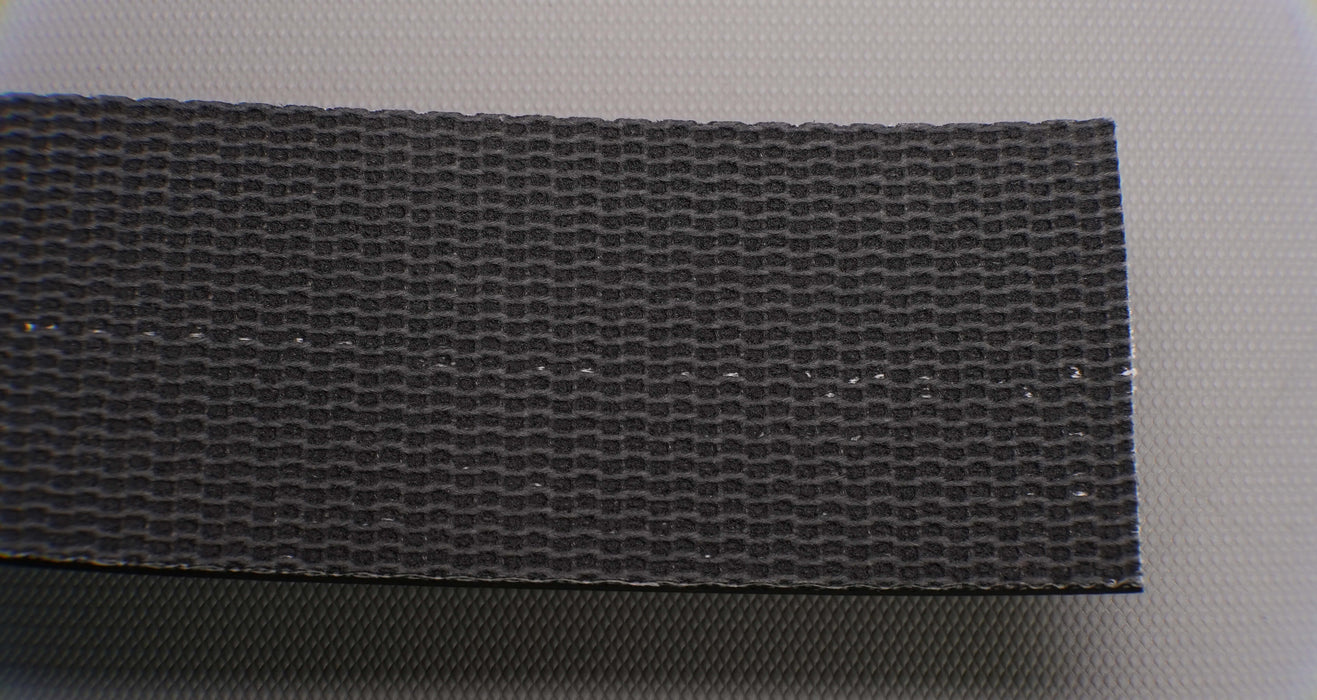 Back view of PVC conveyor belt with black fabric bottom, 4.5mm thickness, made from interwoven fabric with 28nm strength.