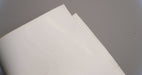 Back view of PVC conveyor belt with fabric bottom, white color, and 6mm thickness, made from interwoven fabric with 28nm strength.






