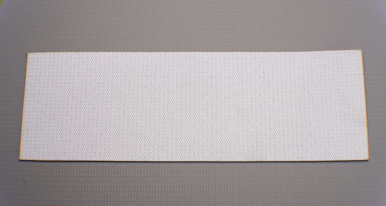Alternate back side view of PVC conveyor belt with 2mm thickness, white bottom color, and fabric surface.