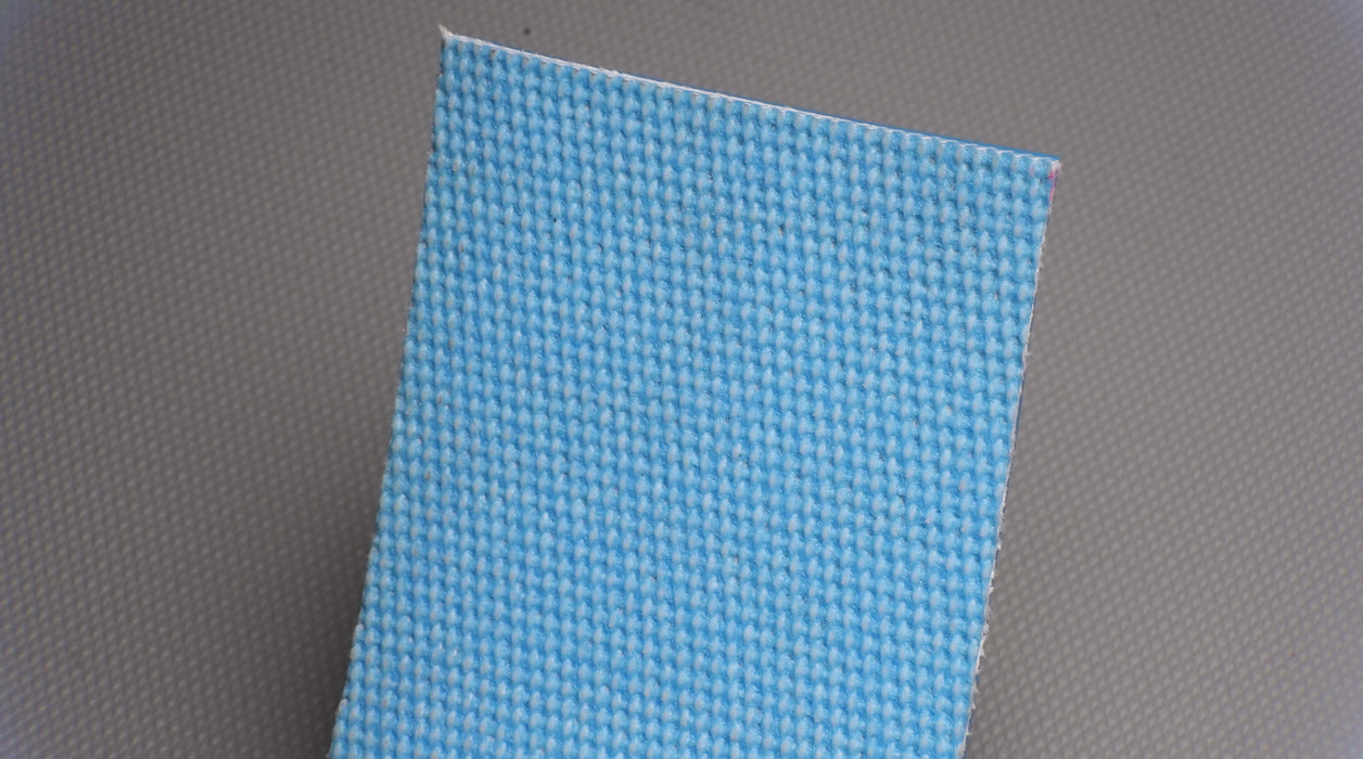 Bottom view of PVC conveyor belt with fabric material in blue, 4.5mm thickness, made from interwoven fabric with 28nm strength.