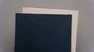 Smooth green top of PVC 3-layer polyester conveyor belt.