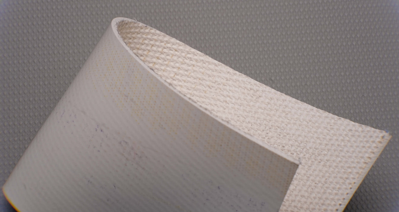 Top and bottom view of PVC conveyor belt with smooth white top, fabric bottom, and 4.5mm thickness, made with interwoven fabric and 28nm strength.