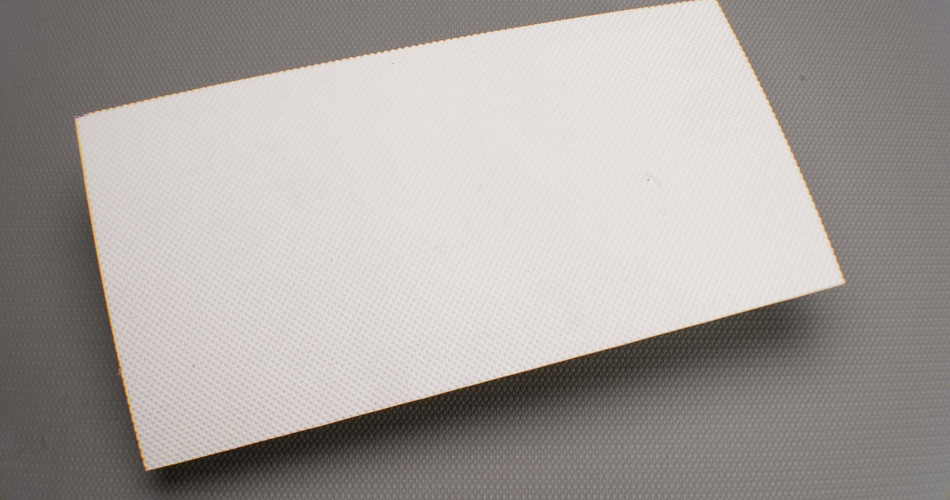 Top view of PVC conveyor belt showing white negative pyramide surface, 2.20mm thickness.