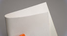 PVC conveyor belt showing white negative pyramide top and white polyester fabric bottom, 2.20mm thickness, both sides view.