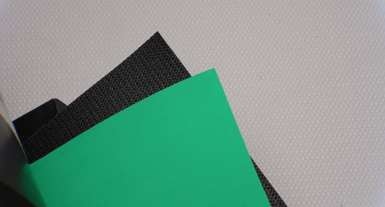 Polyurethane conveyor belt with 6 N/mm strength, green top, black bottom, and 0.5mm thickness