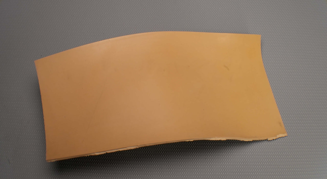 Back view of Puregum tan rubber with 1/8 inch thickness, tan color, 40 durometer, 3000 psi tensile strength, and 700% elongation.