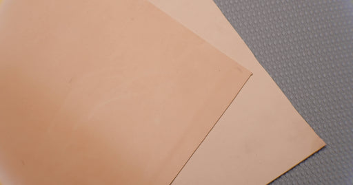 Front and back view of Puregum tan rubber with 1/32 inch thickness, tan color, 40 durometer, 3000 psi tensile strength, and 700% elongation.