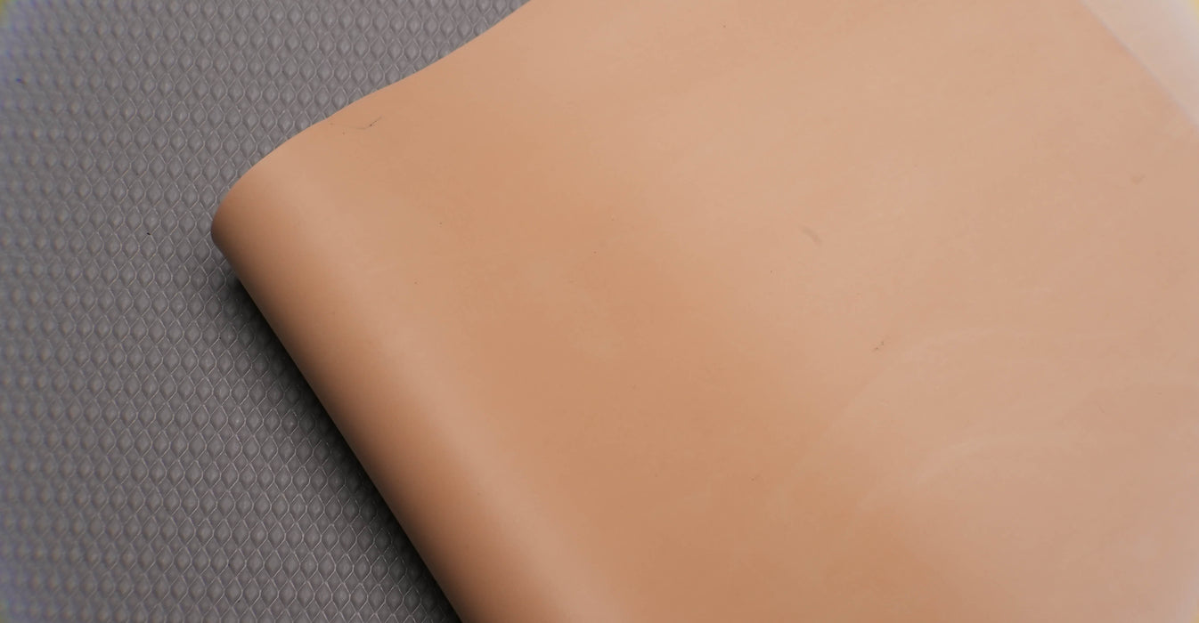 Front view of Puregum tan rubber with 1/32 inch thickness, tan color, 40 durometer, 3000 psi tensile strength, and 700% elongation.