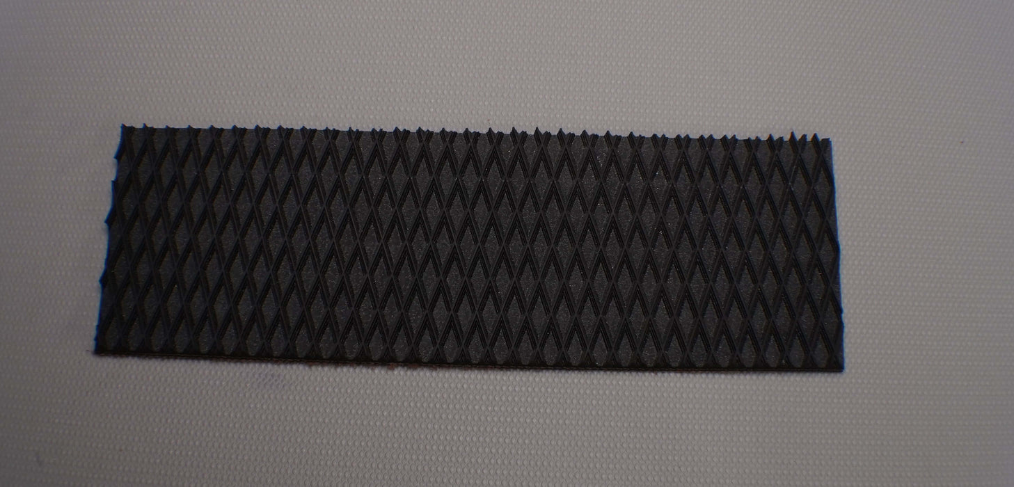 9/32' thickness detail of rubber conveyor belt with diamond top.