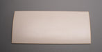 Back view of rubber conveyor belt with smooth white surface, 3/16 inch thickness, and a temperature range of -22°F to +176°F.