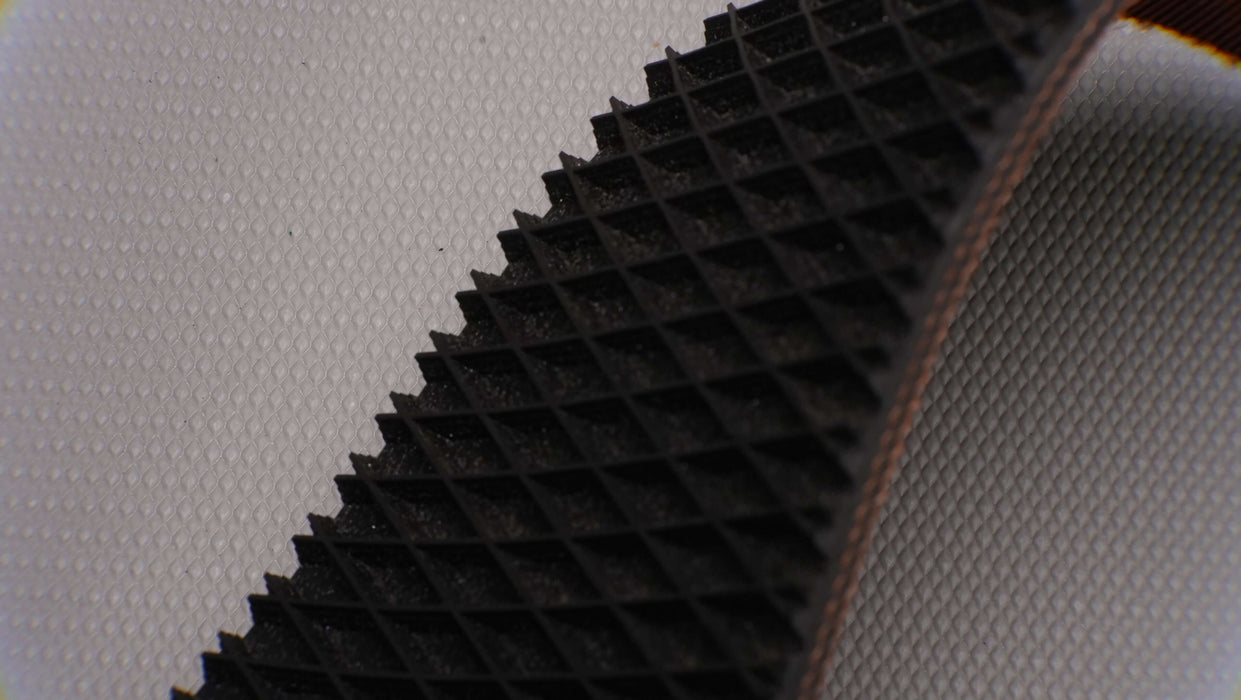 Brown bottom view of rubber 2-layer conveyor belt.